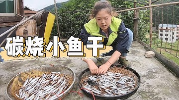 Xiao Zengは7匹のサンマを捕まえ、弱火でゆっくりと焼きました