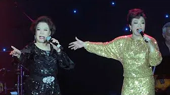 偷偷摸摸 performed by 刘雅丽 Alice Lau, and 包晓华 Selina Pao